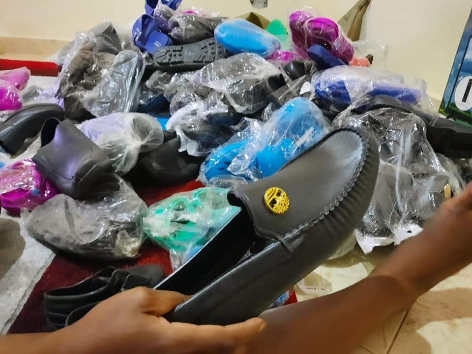 BUYING SHOES FOR KABIRAMAIDO COMMUNITY.