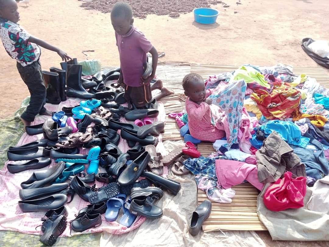 COMMUNITY 1 BLESSED WITH CLOTHES AND SHOES.