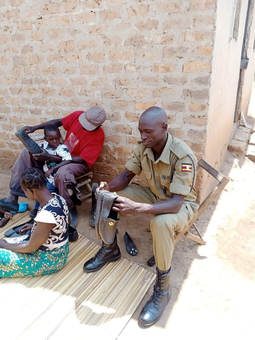 A POLICE MAN IS JOYOUS OF RECEIVING NEW SHOES !!!