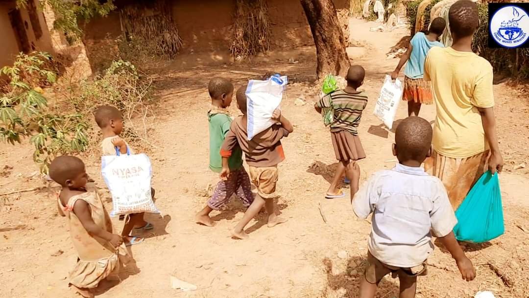 GIVING HOMES FOOD AND THE GOSPEL .