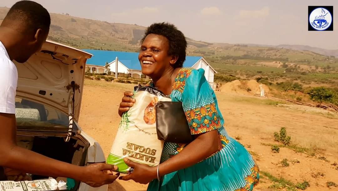 BLESSING HOMES WITH FOOD .