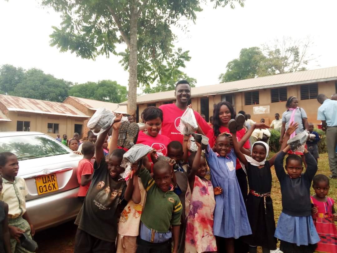 BUY A SCHOOL SHOES GIVE OUT .