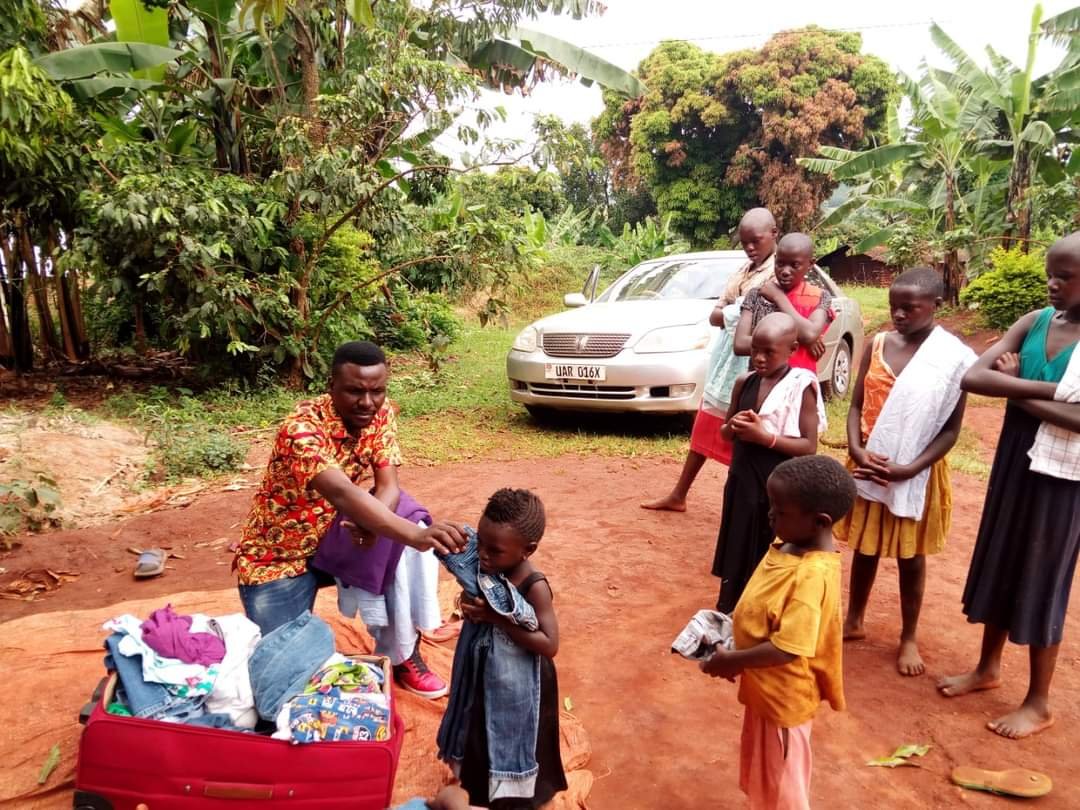 CLOTHING MPIGI BOZA COMMUNITY OUT REACH .