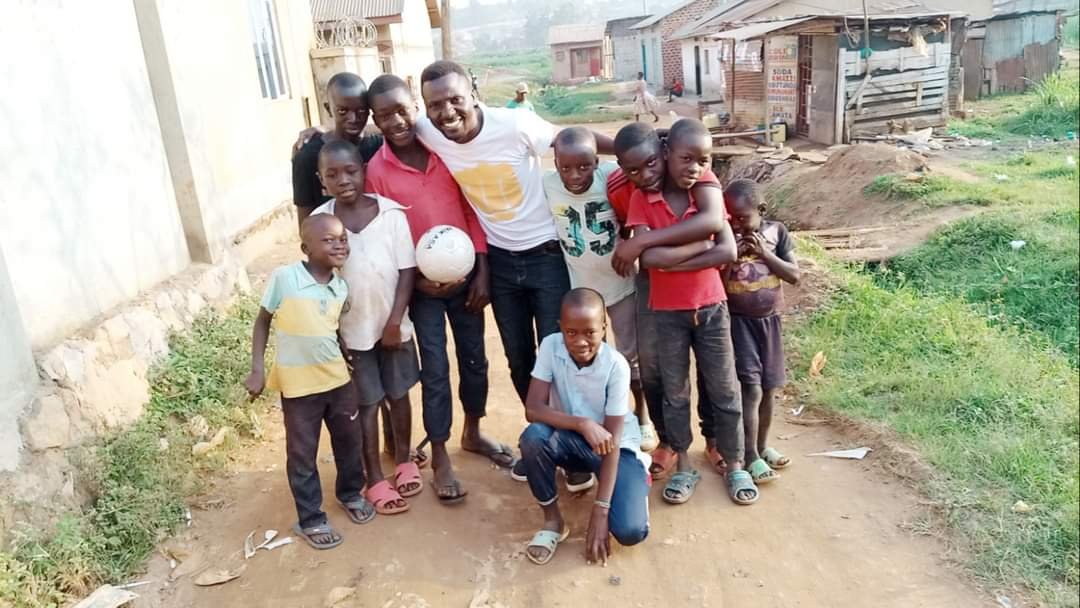 BLESSING GHETO CHILDREN WITH NEW BALLS.