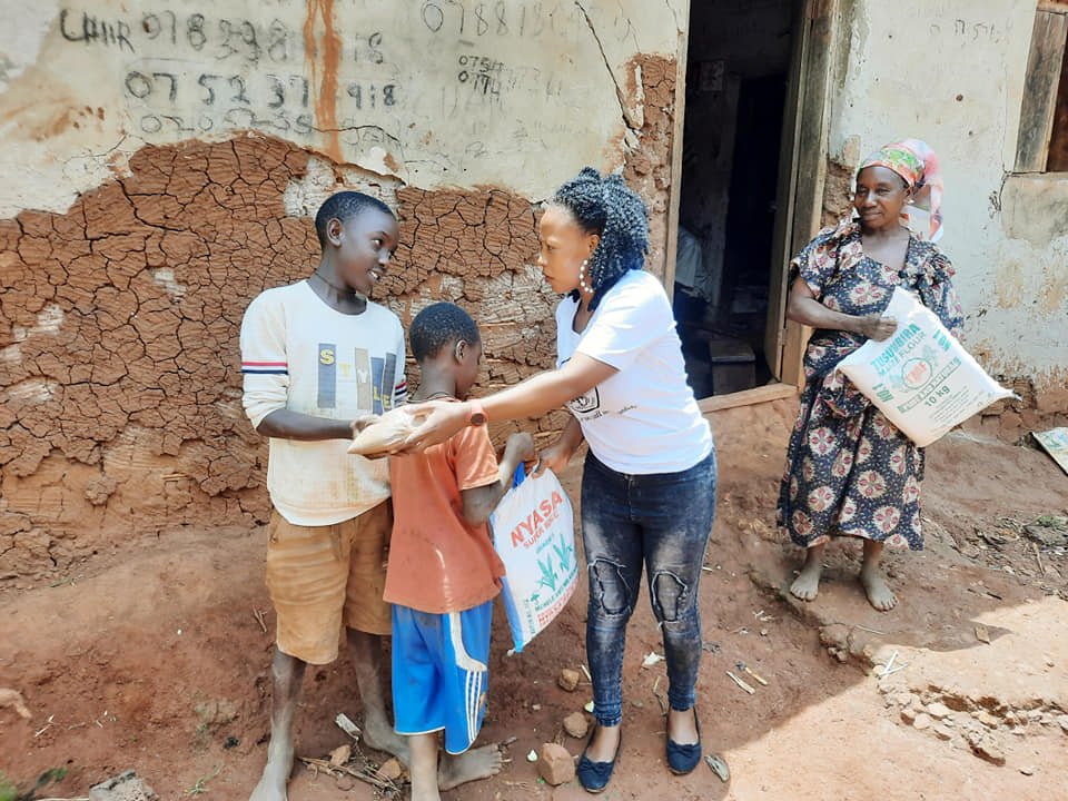 VISITING THE NEEDY WITH THE GOSPEL AND GIVING .