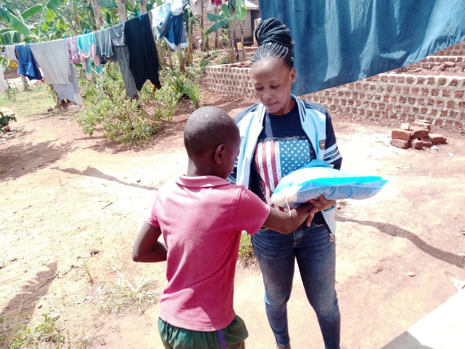 BLESSING HOMES WITH THE GOSPEL AND FOOD.