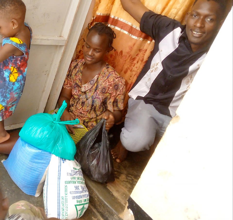 REACHING OUT TO A PASTOR'S HOME WITH FOOD.