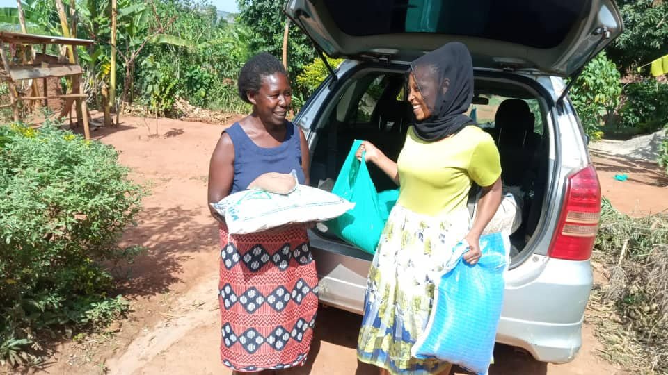 GIVING FOOD AND BIBLES REACHOUT .